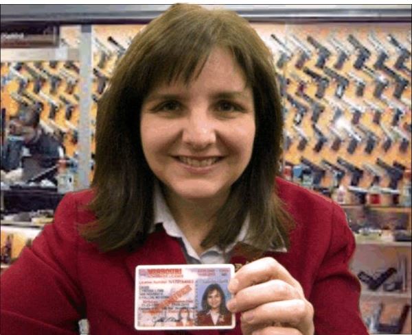 This is a photo of me with my concealed carry license.  Should I have had to get one?  According to the U. S. Constitution "...the right of the people to keep and bear arms shall not be infringed."  What does that mean?
