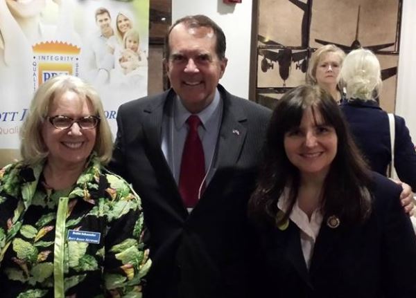 While at the Eagle Forum Conference, I visited with some colleagues in the battle to save our country. I am here with Bobbi Schuessler, account executive and Rich Bott at the Bott Radio Network Booth. In the background is Judy Sofka with the Missouri Precinct Project. 